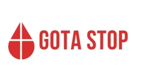 A imagem mostra o logotipo da marca "GOTA STOP", composto por uma gota vermelha estilizada dividida por uma linha que forma uma cruz negativa, acompanhada pelo nome da marca em letras maiúsculas vermelhas ao lado. O design sugere parar problemas de saúde relacionados ao sangue ou a fluídos corpóreos.